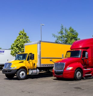 yellow box truck and red sleeper