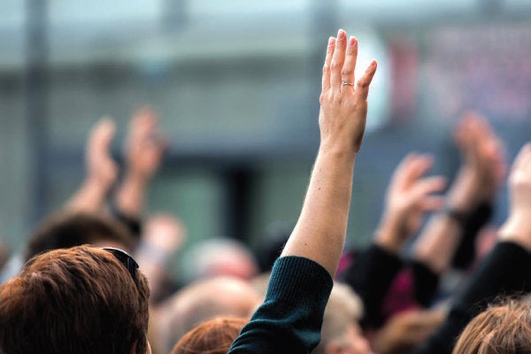 people raising hands