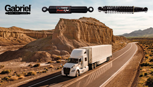 Gabriel shocks and steering stabilizer products above a white semi-truck driving on a desert highway with rock formations